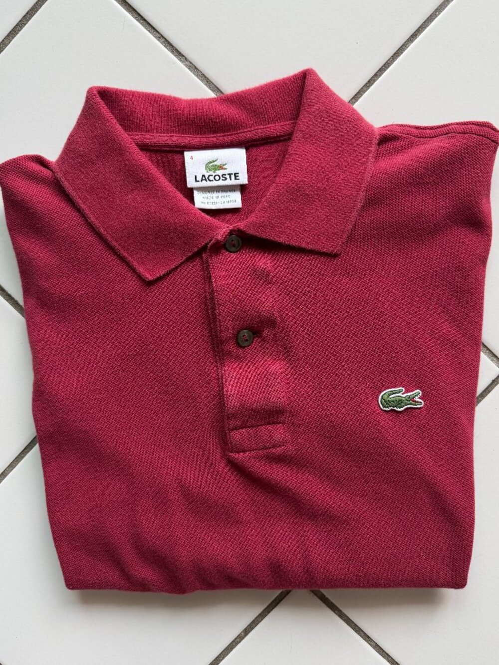 Red classic fit Lacoste men's polo (size M)